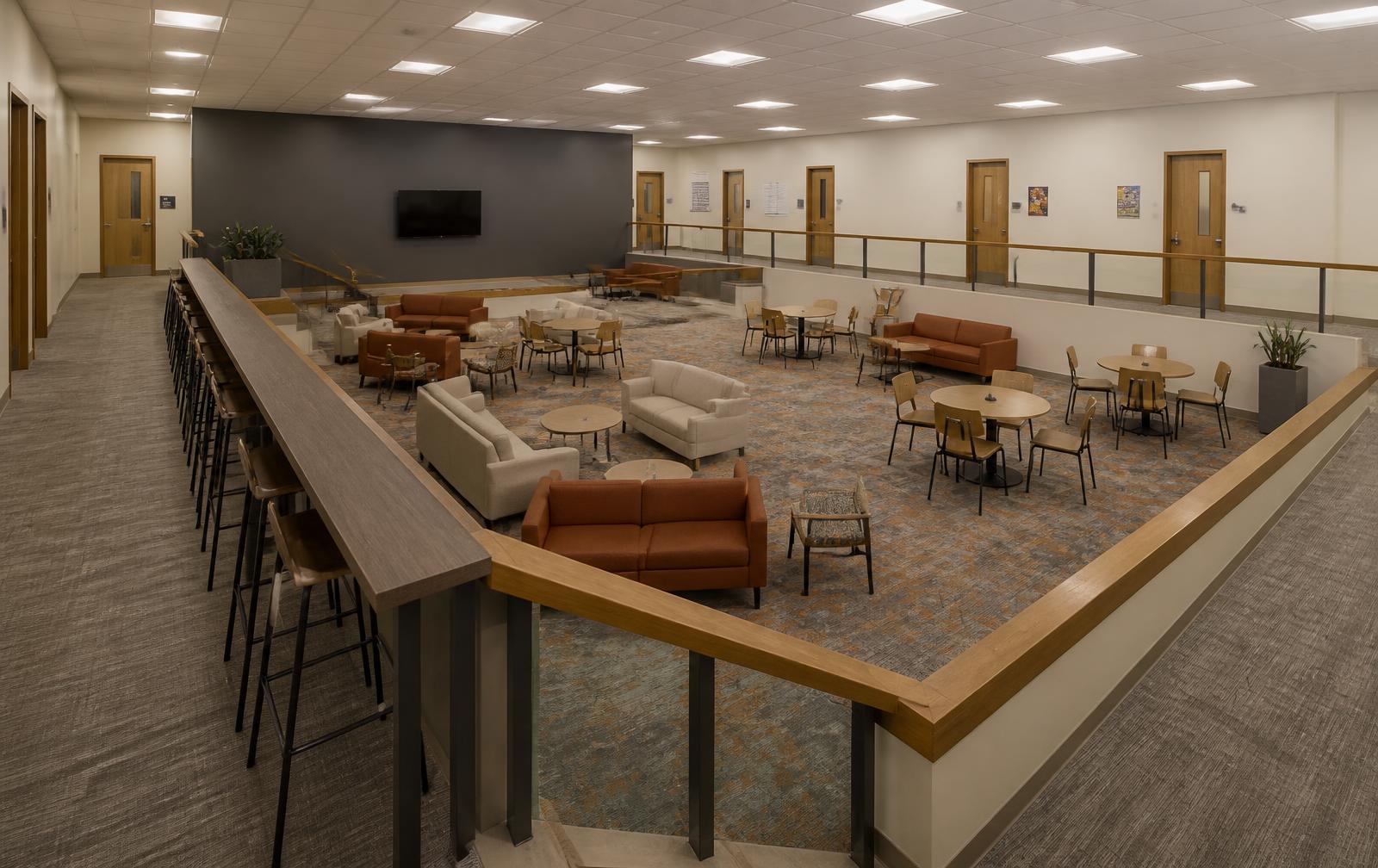 Overview of the Market Terrace concept with a slatted oak canopy, cafe tables and perimeter banquette